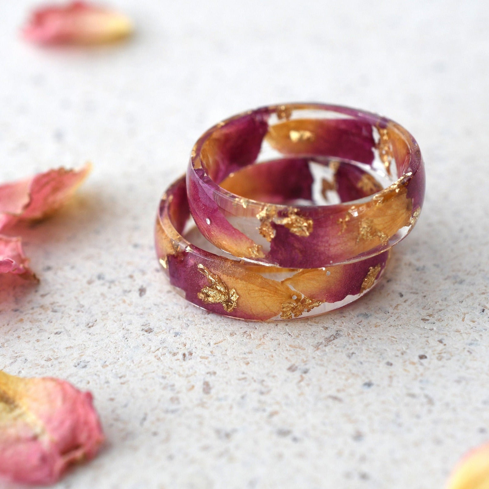 Side view showing smooth resin finish and embedded rose petals in Rose Bloom Ring