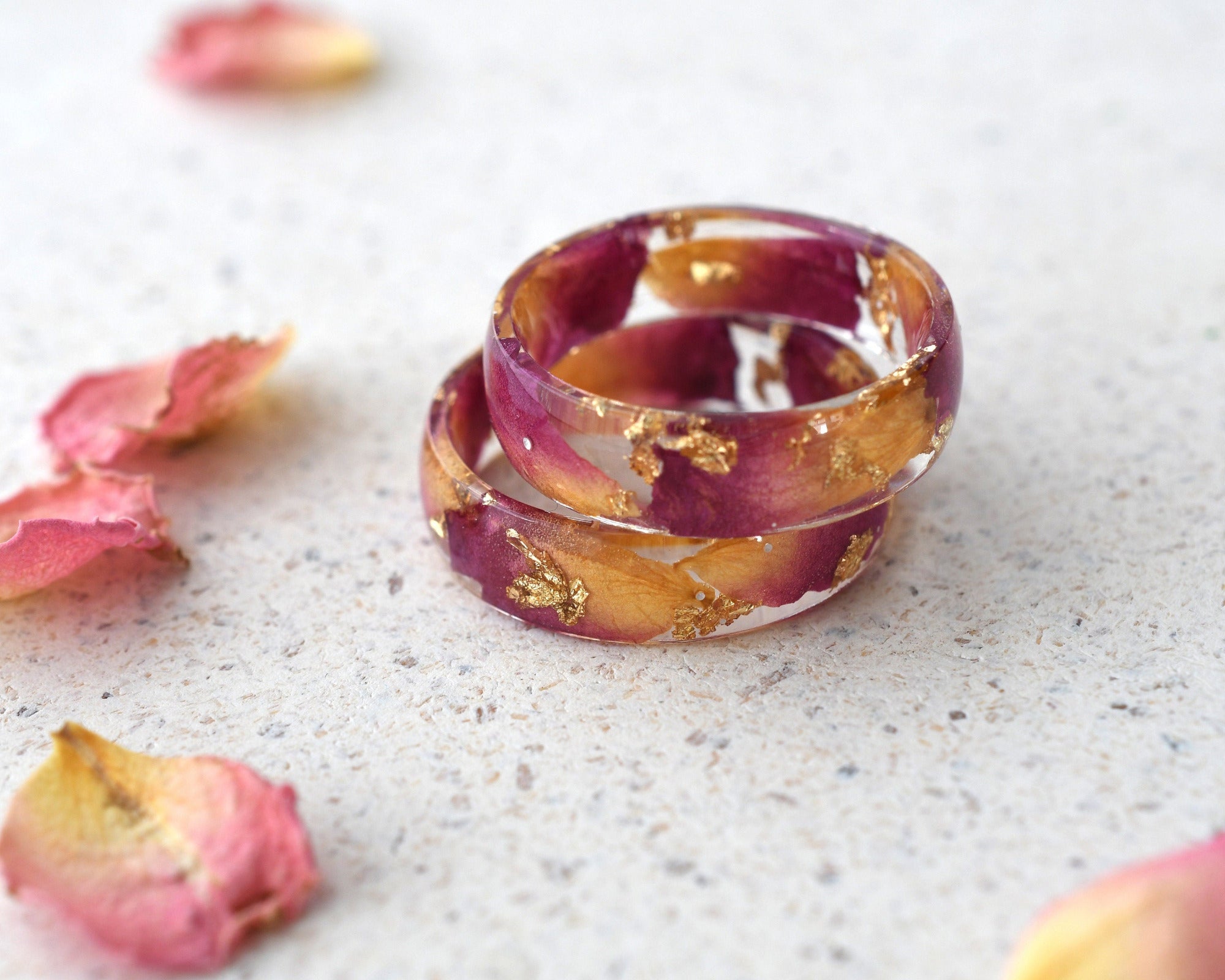 Side view showing smooth resin finish and embedded rose petals in Rose Bloom Ring