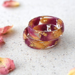Side view showing smooth resin finish and embedded rose petals in Rose Bloom Ring