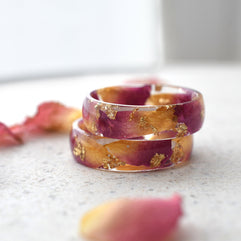 Rose Bloom Ring stacked with other rings, showing its compatibility and beauty in sets