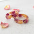 a couple of rings sitting on top of a table