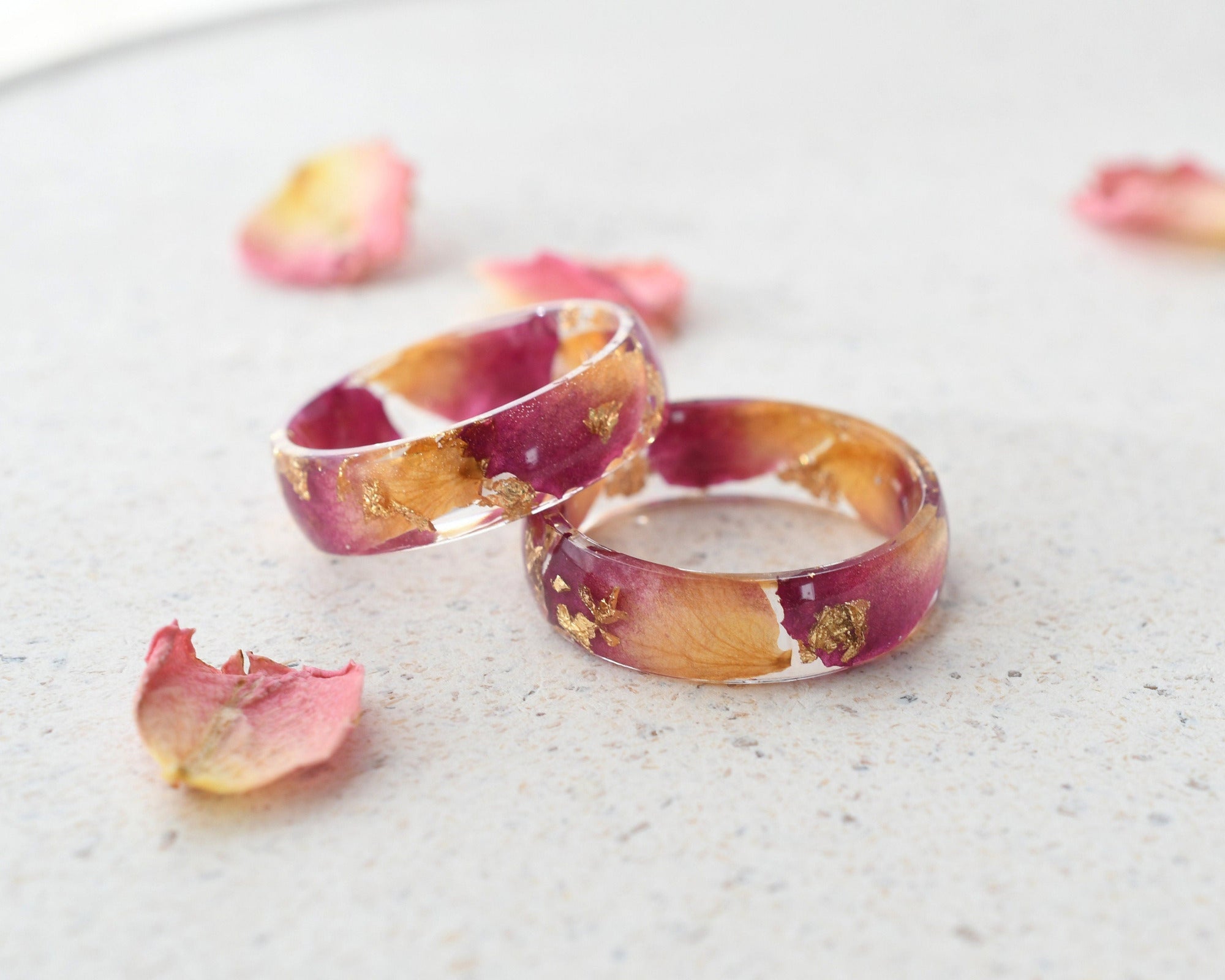 a couple of rings sitting on top of a table