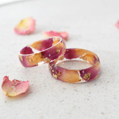 a couple of rings sitting on top of a table