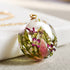 Moss, pink alyssum, and pink tourmaline crystal necklace handmade by Resity in Vienna