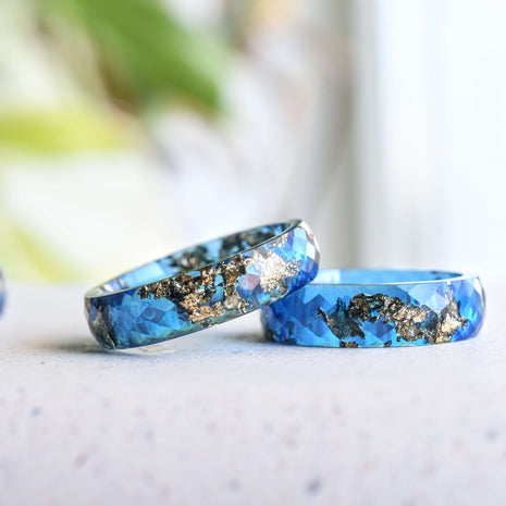 Sapphire blue resin ring with gold flakes handmade by Resity in Vienna