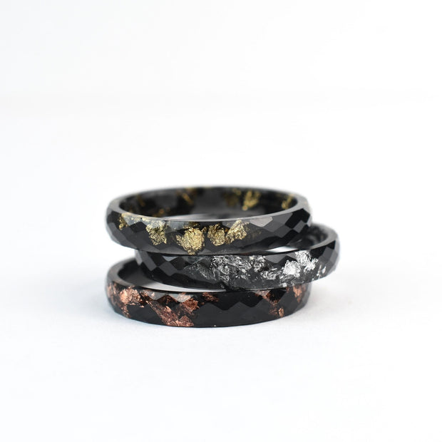 Stackable black resin ring with metallic leaf in your choice of gold, silver, or rose gold.