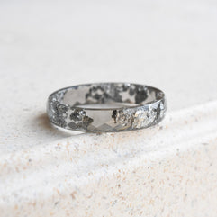 Slim faceted grey resin stacking ring with metallic silver flakes handmade in Vienna