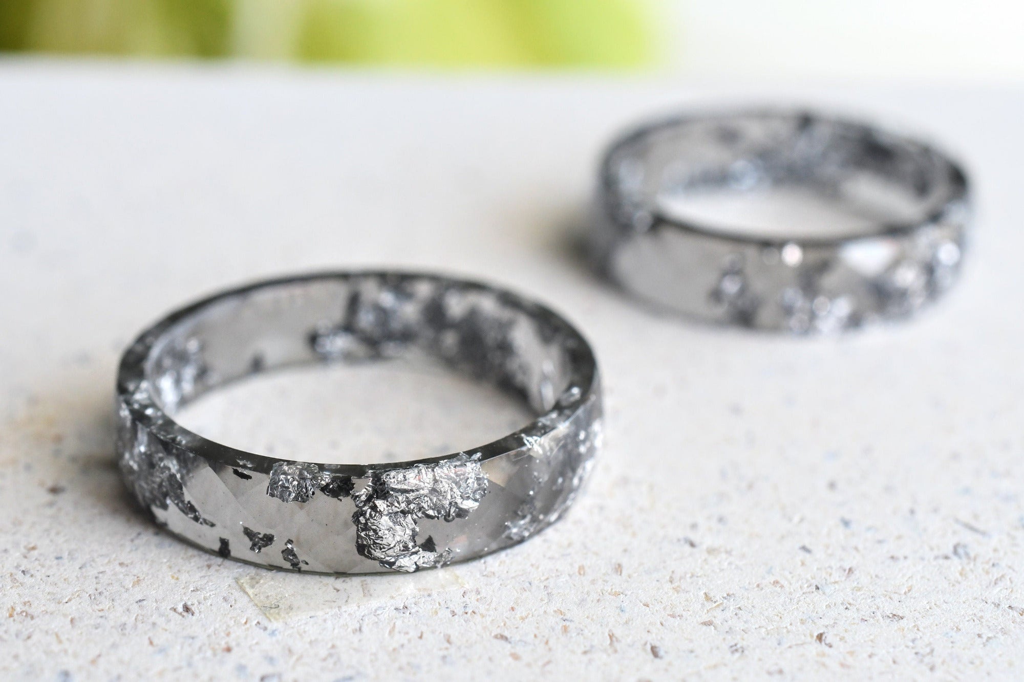 Grey faceted resin ring with silver flakes handmade by Resity in Vienna