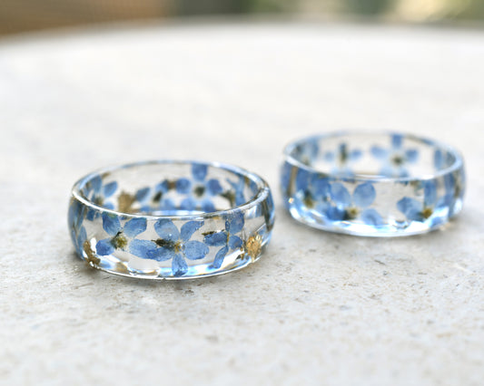 Handmade resin ring with real forget-me-not flowers and shimmering gold flakes