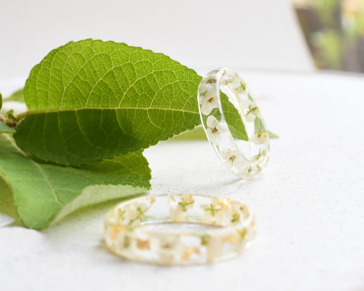 White alyssum thin resin ring with gold leaf accents
