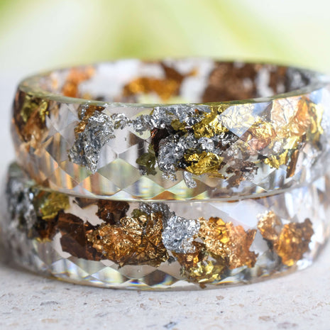 Transparent resin ring with mixed metallic flakes handmade by Resity in Vienna