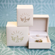 Cream vegan leather jewelry box — minimalist premium gift packaging