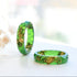 Bright green resin ring with gold flakes handmade by Resity in Vienna