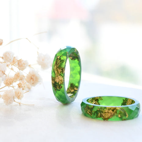 Bright green resin ring with gold flakes handmade by Resity in Vienna