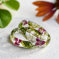 Moss and alyssum resin ring handmade by Resity in Vienna — delicate botanical jewelry