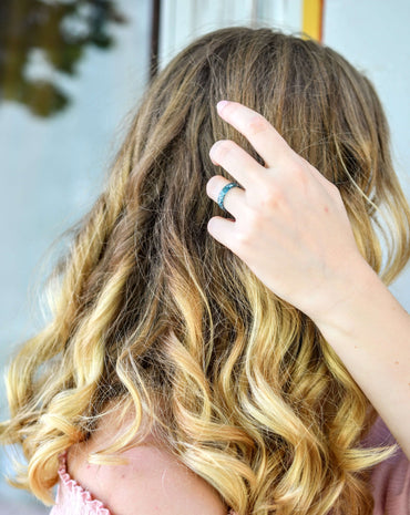 Midnight Bloom Ring worn on hand showing its elegant and moody design