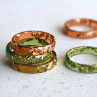 Handmade amber resin ring with real gold leaf — minimalist faceted jewelry crafted in Vienna by Resity