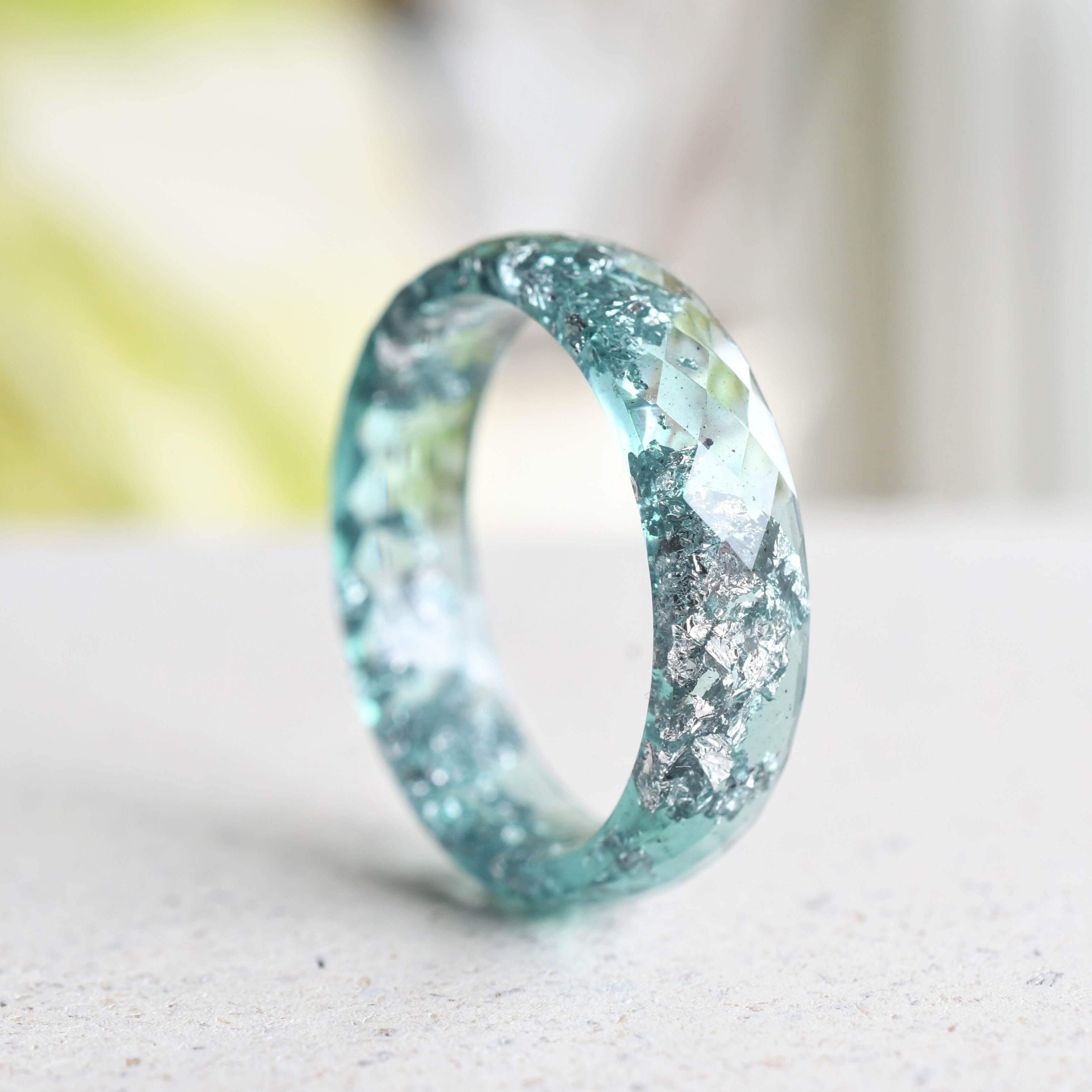 aquamarine epoxy ring on white background