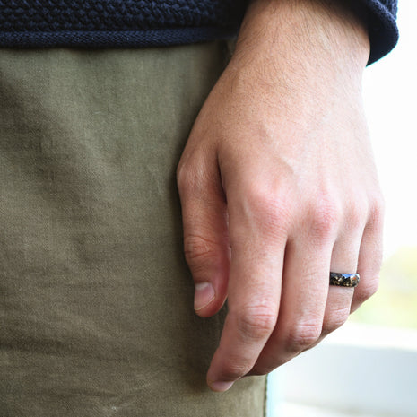 Obsidian Signal Ring styled with masculine accessories for everyday wear