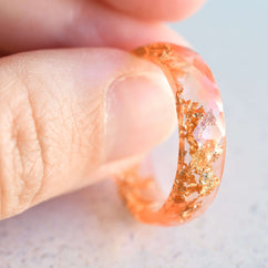 Coral Glow Ring — wide coral resin ring with gold leaf detail, handmade modern jewelry from Vienna