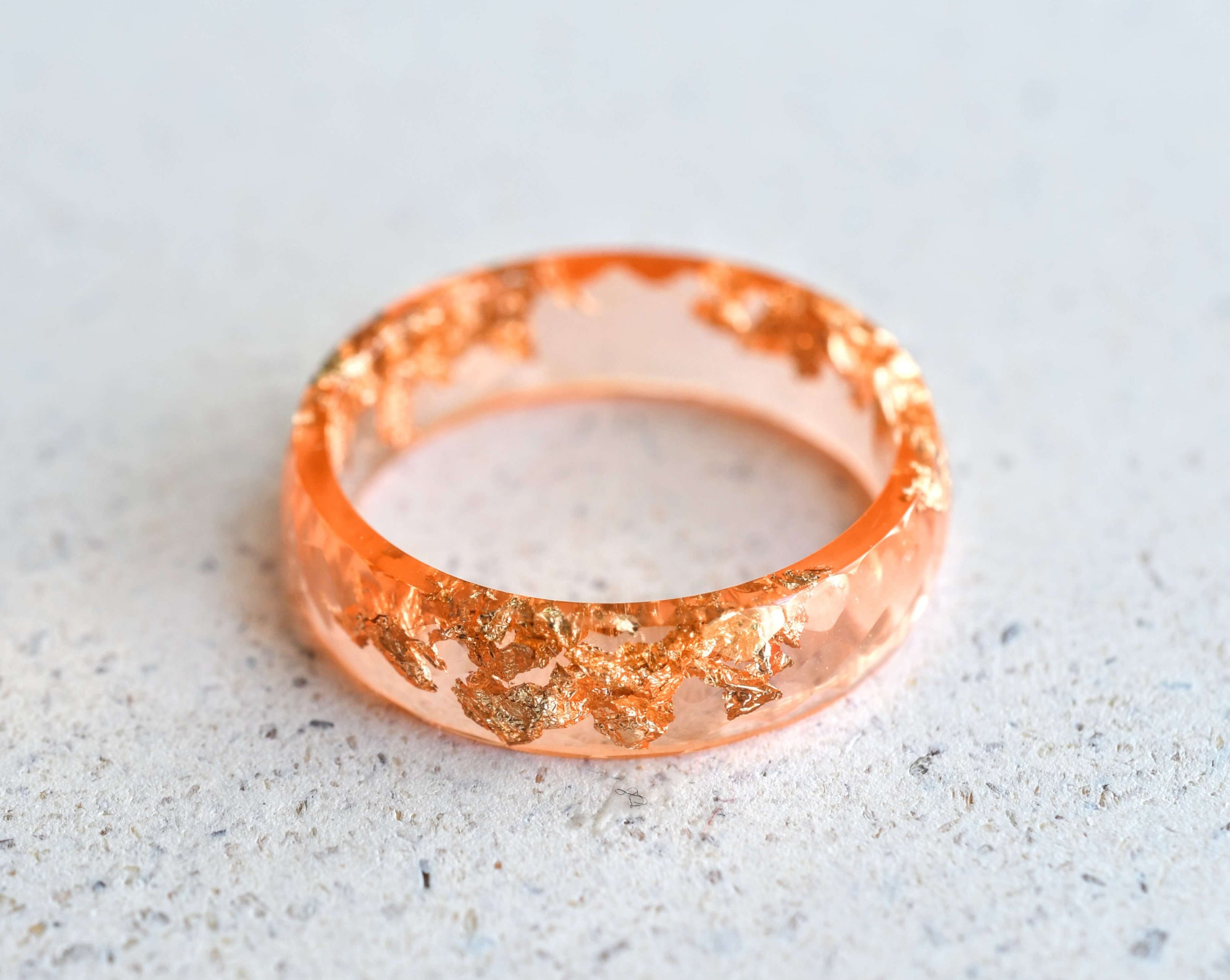 Handmade coral resin ring with real gold leaf — bold minimalist jewelry crafted in Vienna by Resity