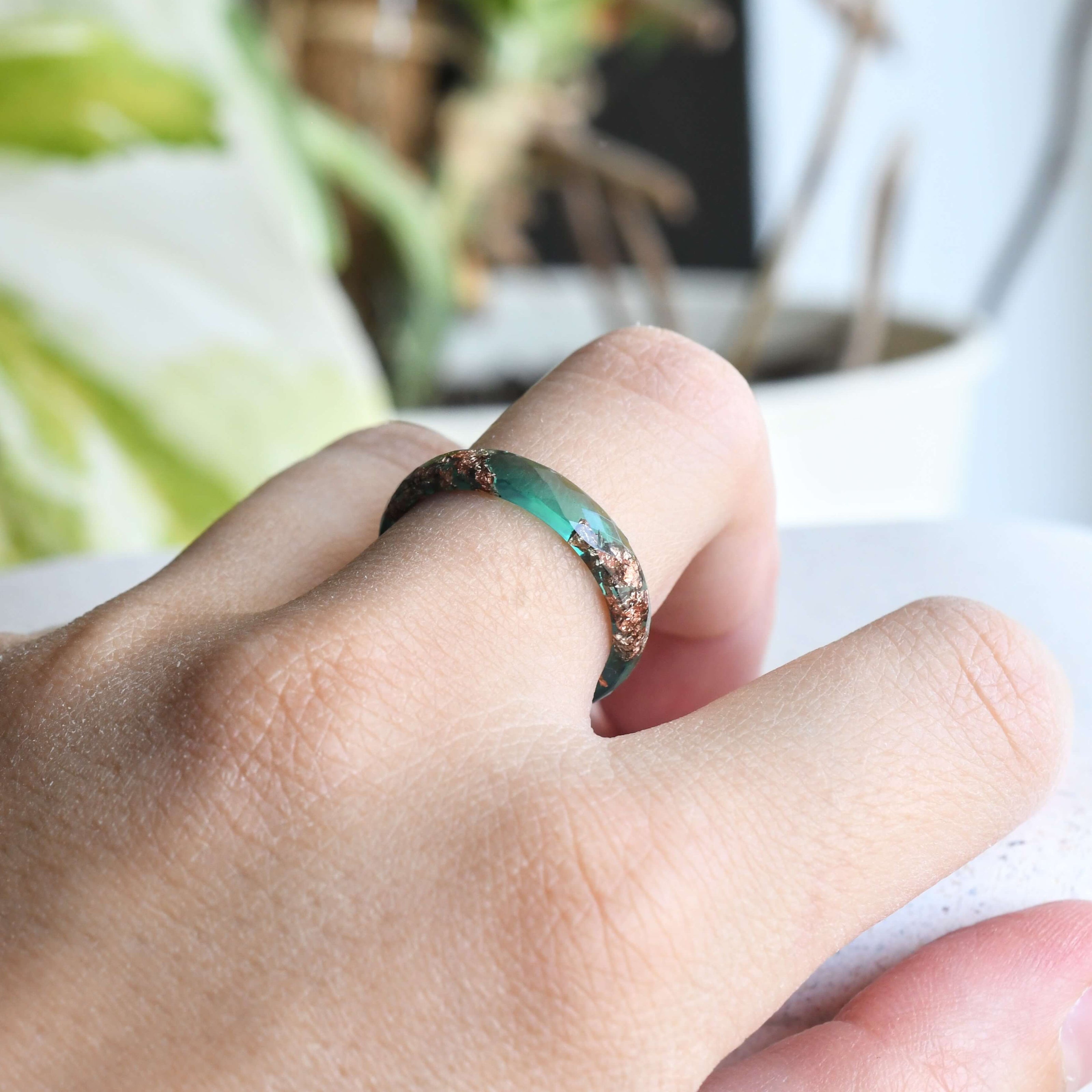 Jade Whisper Ring stacked with other resin bands for a layered, botanical look