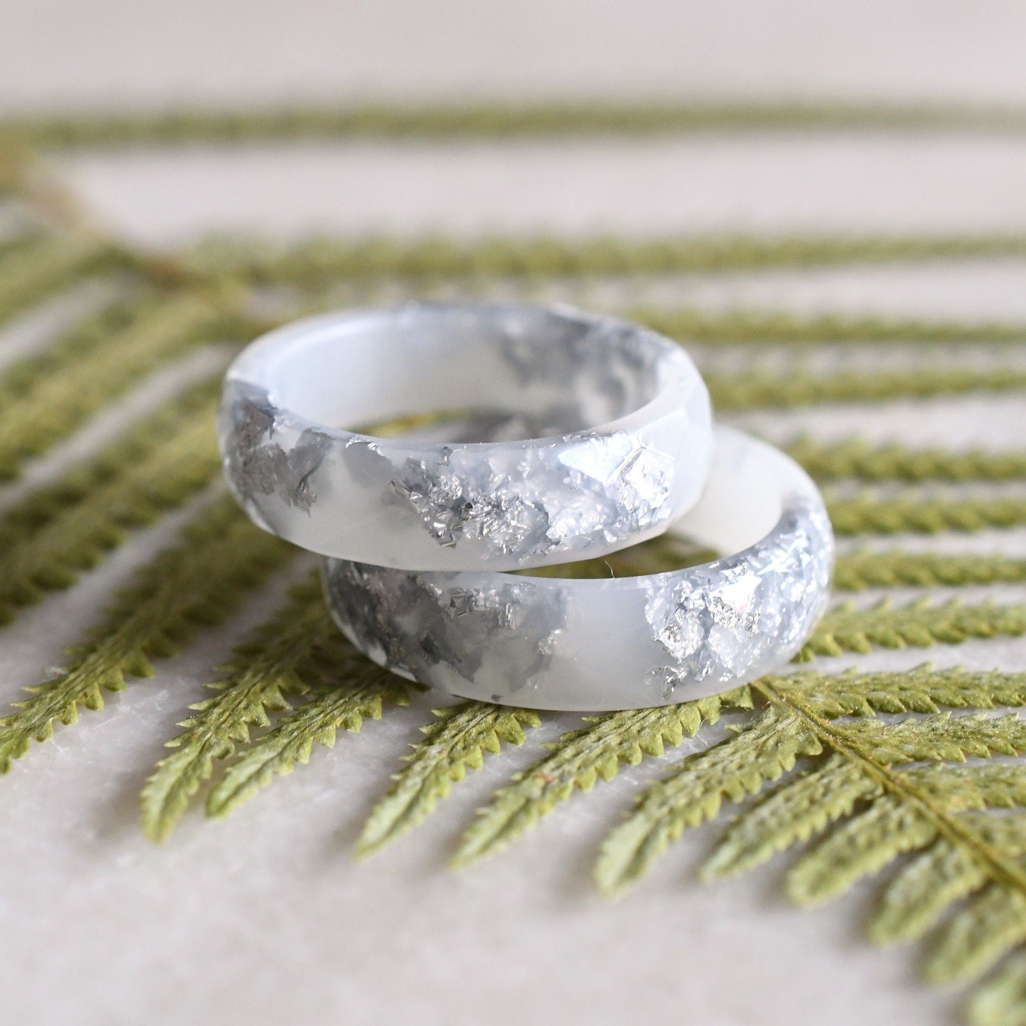 White resin ring with silver flakes handmade by Resity in Vienna