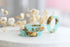 Close-up of gold flakes suspended in turquoise resin handmade ring