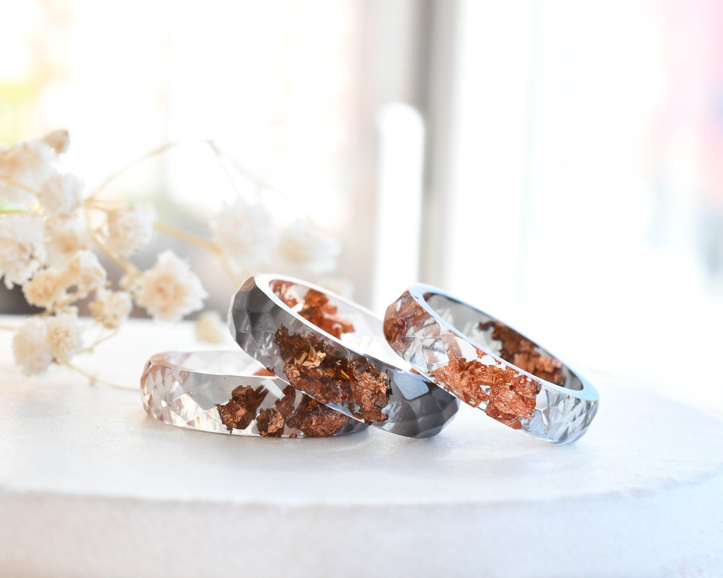Faceted grey and clear resin ring with shimmering rose gold flakes — handmade jewelry