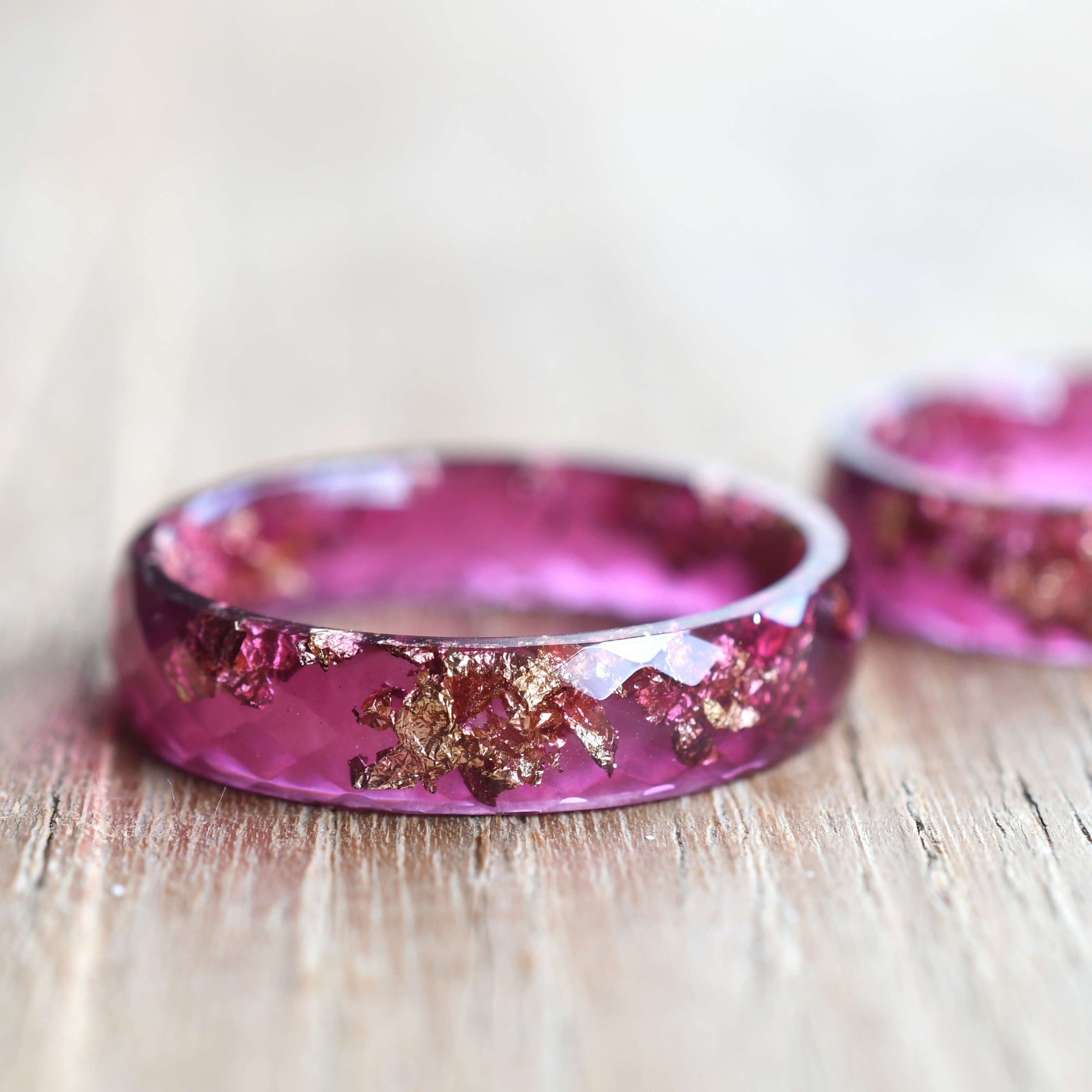 Handmade magenta resin ring with real gold leaf — modern statement jewelry crafted in Vienna by Resity