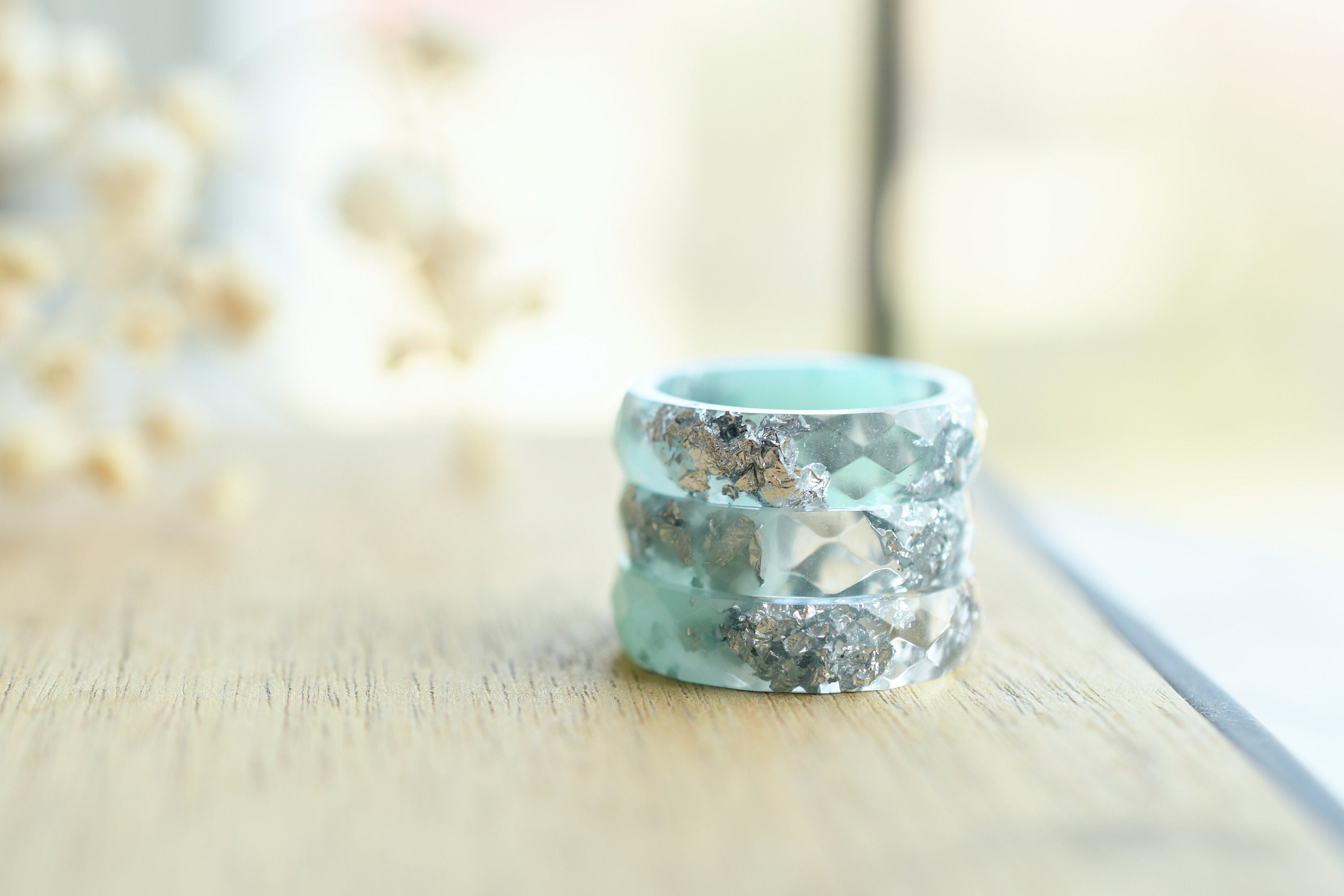 mint and transparent rings with silver foil