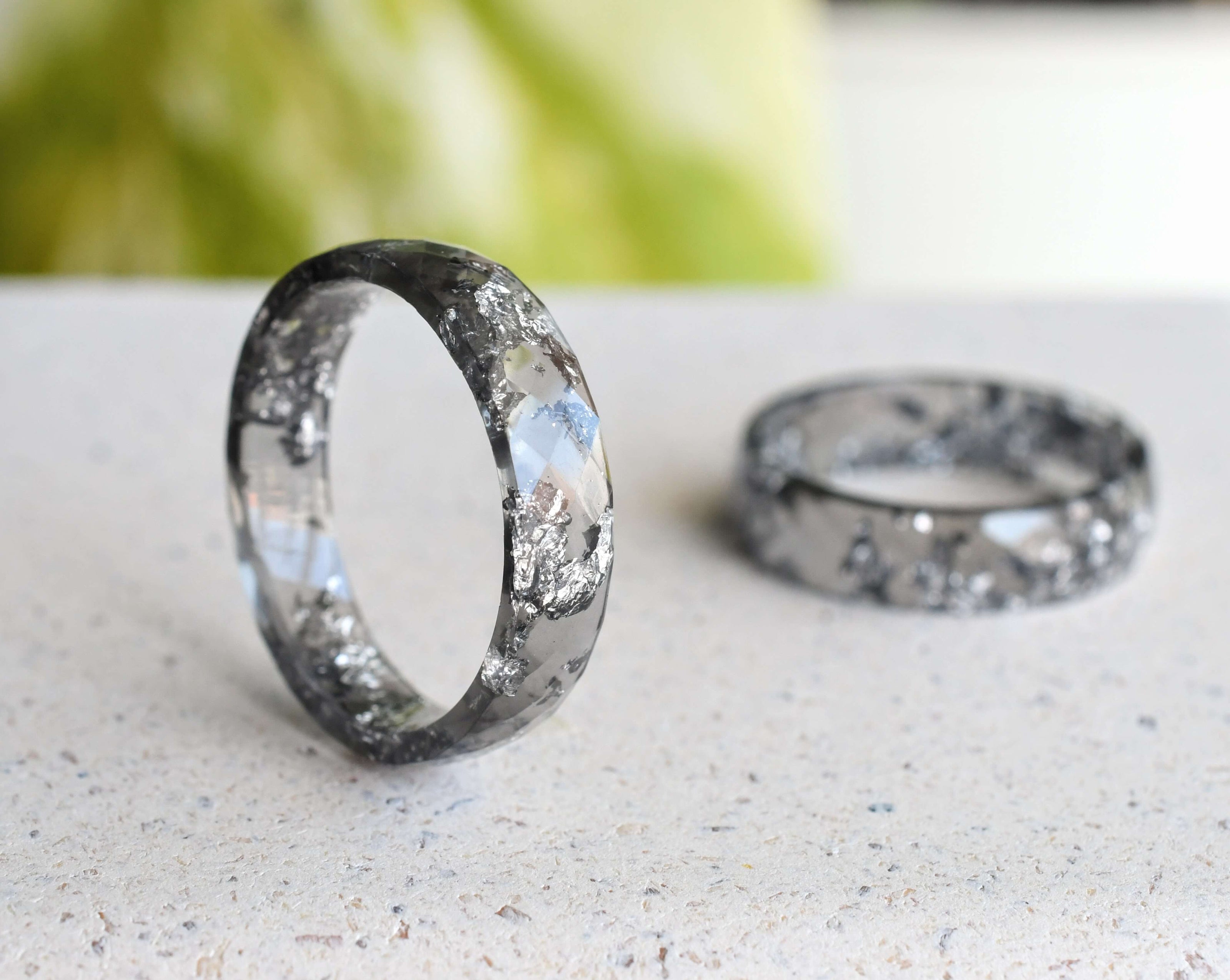 Side view showing the 6mm width and clean lines of the Charcoal Silver Leaf Ring