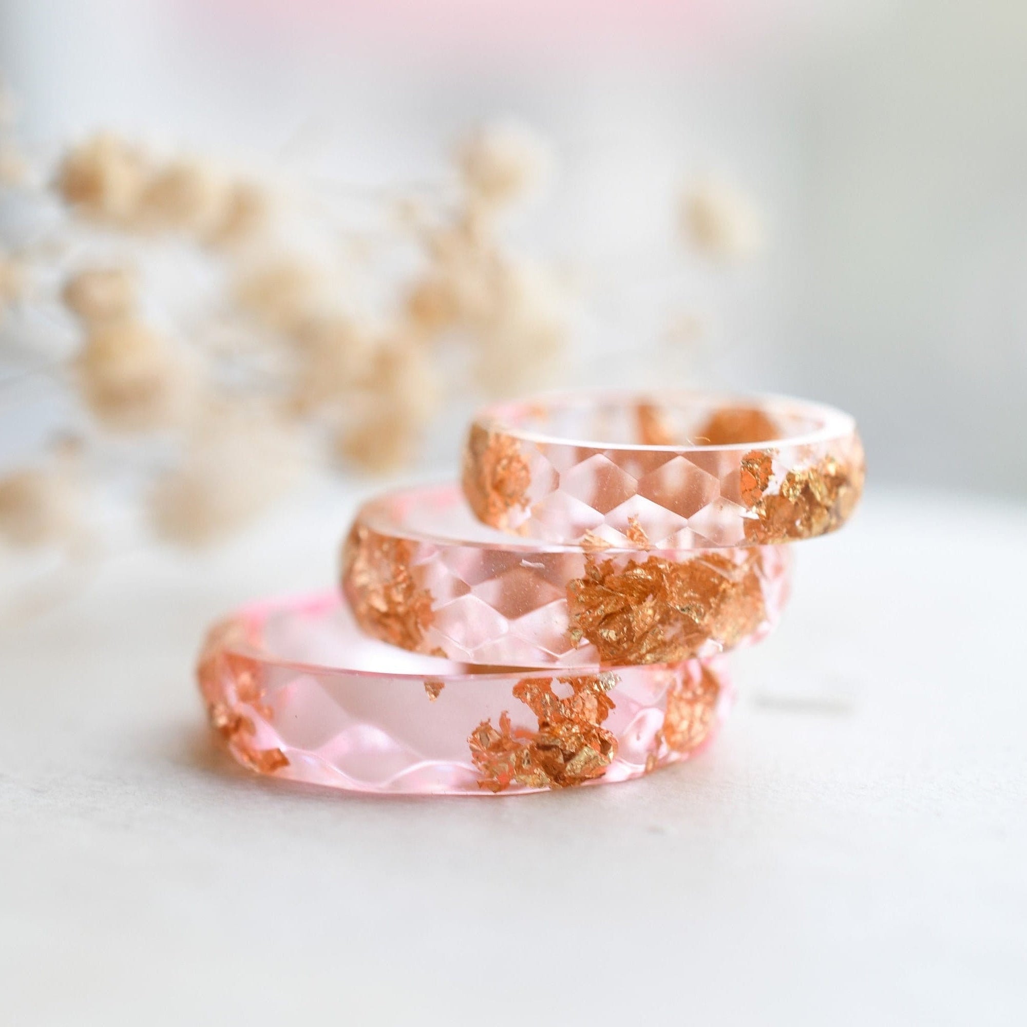 Pink faceted resin ring with gold flakes handmade by Resity in Vienna
