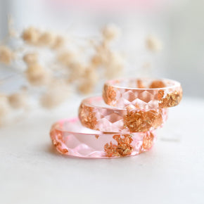 Pink faceted resin ring with gold flakes handmade by Resity in Vienna
