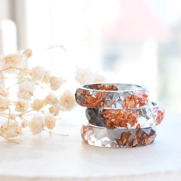 Grey and transparent resin ring with rose gold flakes handmade by Resity in Vienna