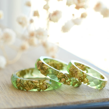 Light green resin ring with gold flakes handmade by Resity in Vienna