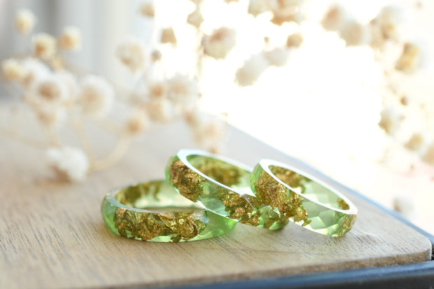 Light green resin ring with gold flakes handmade by Resity in Vienna