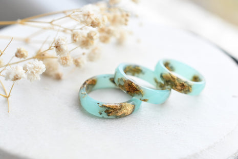Turquoise resin ring with gold flakes handmade by Resity in Vienna