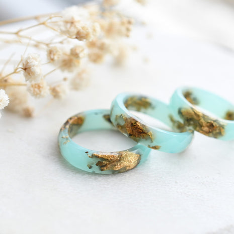 Turquoise resin ring with gold flakes handmade by Resity in Vienna