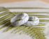 Smooth white resin ring with shimmering silver flakes — minimalist handmade jewelry
